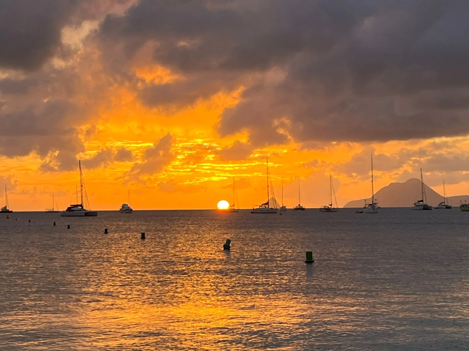 Sunset over the sailing boats of the Le Marin marina